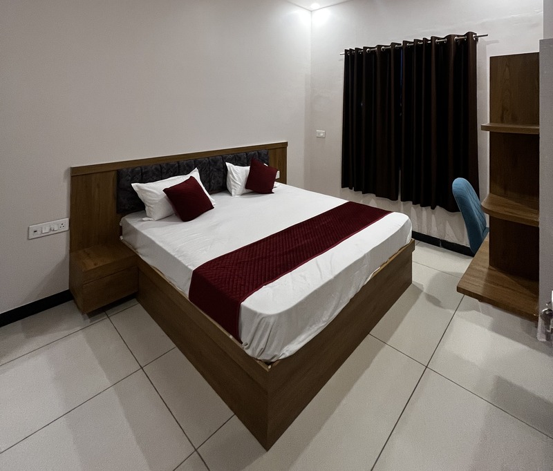 Hotel Kamala Room Interior with Comfortable Bed